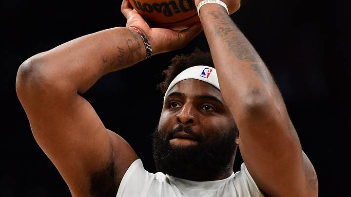 Oct 14, 2026; Boston, Massachusetts, USA;  Boston Celtics center Mitchell Robinson (4) shoots the ball during warmups prior to a game against the Charlotte Hornets at TD Garden. Mandatory Credit: Bob DeChiara-Imagn Images