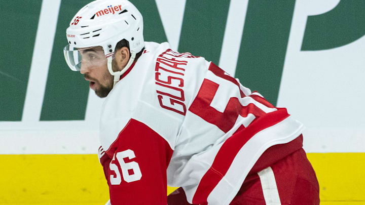 Mar 10, 2025; Ottawa, Ontario, CAN; Detroit Red Wings defenseman Erik Gustafsson (56) skates with the puck in the third period against the Ottawa Senators at the Canadian Tire Centre. Mandatory Credit: Marc DesRosiers-Imagn Images