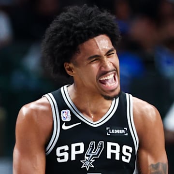 Oct 22, 2025; Dallas, Texas, USA; San Antonio Spurs guard Dylan Harper (2) reacts during the first half against the Dallas Mavericks at American Airlines Center.