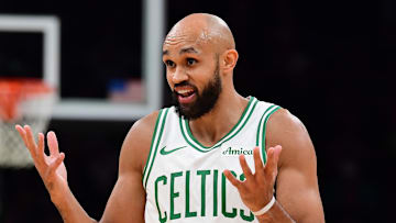 Nov 23, 2025; Boston, Massachusetts, USA; Boston Celtics guard Derrick White (9) reacts towards the official after a play during the second half against the Orlando Magic at TD Garden. Mandatory Credit: Bob DeChiara-Imagn Images