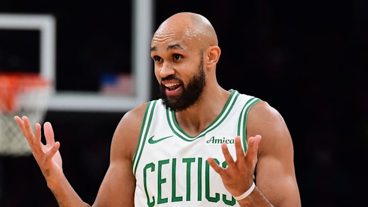 Nov 23, 2025; Boston, Massachusetts, USA; Boston Celtics guard Derrick White (9) reacts towards the official after a play during the second half against the Orlando Magic at TD Garden. Mandatory Credit: Bob DeChiara-Imagn Images