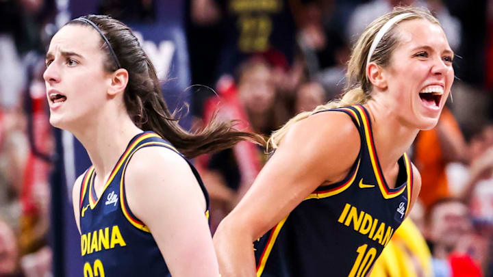 Indiana Fever guards Caitlin Clark and Lexie Hull celebrate during a game between the Indiana Fever and the New York Liberty