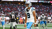 Nov 16, 2025; Atlanta, Georgia, USA; Carolina Panthers quarterback Bryce Young (9) reacts to a touchdown in the fourth quarter against the Atlanta Falcons at Mercedes-Benz Stadium. 
