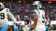 Nov 16, 2025; Atlanta, Georgia, USA; Carolina Panthers quarterback Bryce Young (9) reacts to a touchdown in the fourth quarter against the Atlanta Falcons at Mercedes-Benz Stadium. 
