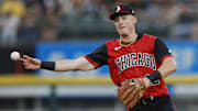 Chicago White Sox shortstop Colson Montgomery (12) throws to first base at Rate Field.