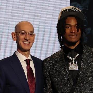 Jun 26, 2024; Brooklyn, NY, USA; Stephon Castle poses for photos with NBA commissioner Adam Silver after being selected in the first round by the San Antonio Spurs in the 2024 NBA Draft at Barclays Center.