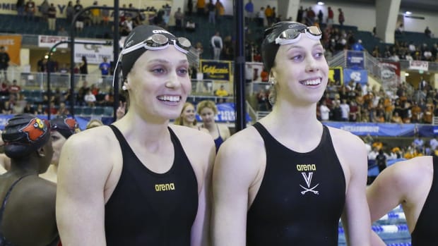 U.S. swimmers Alex Walsh, left, and her sister Gretchen Walsh