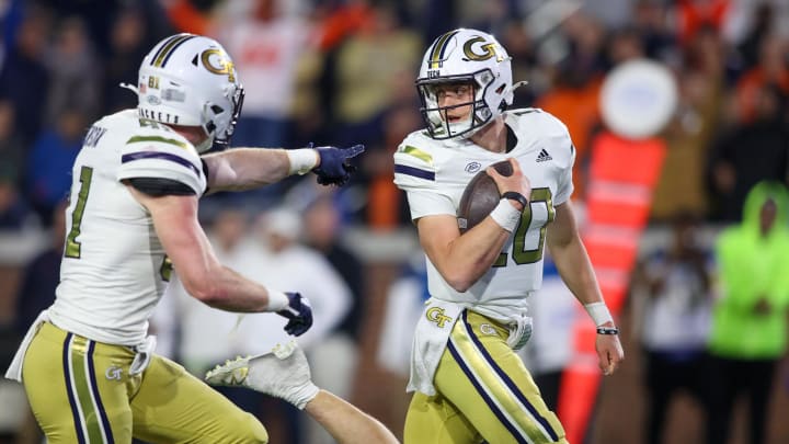 Nov 18, 2023; Atlanta, Georgia, USA; Georgia Tech Yellow Jackets quarterback Haynes King (10) runs for a touchdown against the Syracuse Orange in the second half at Bobby Dodd Stadium at Hyundai Field. Mandatory Credit: Brett Davis-USA TODAY Sports