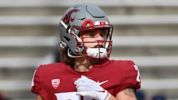 Oct 9, 2021; Pullman, Washington, USA; Current WVU and former Washington State running back Kannon Katzer (28) warms up before a game against the Oregon State Beavers at Gesa Field at Martin Stadium. Mandatory Credit: James Snook-Imagn Images