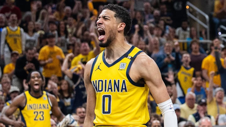 May 12, 2024; Indianapolis, Indiana, USA;  Indiana Pacers guard Tyrese Haliburton (0) celebrates a made basket during game four of the second round for the 2024 NBA playoffs against the New York Knicks at Gainbridge Fieldhouse. Mandatory Credit: Trevor Ruszkowski-Imagn Images