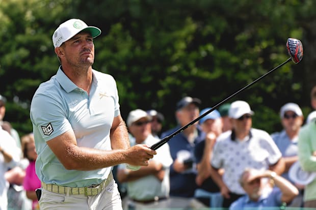 Bryson DeChambeau looks on after a drive.