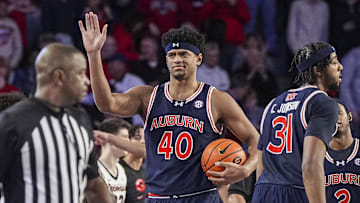 Jan 18, 2025; Athens, Georgia, USA; Auburn Tigers center Dylan Cardwell (40) reacts after Auburn defeated the Georgia Bulldogs at Stegeman Coliseum. Mandatory Credit: Dale Zanine-Imagn Images