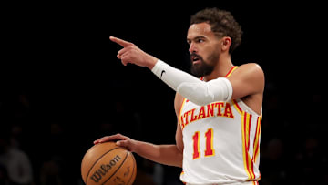 Apr 10, 2025; Brooklyn, New York, USA; Atlanta Hawks guard Trae Young (11) controls the ball against the Brooklyn Nets during the third quarter at Barclays Center. Mandatory Credit: Brad Penner-Imagn Images