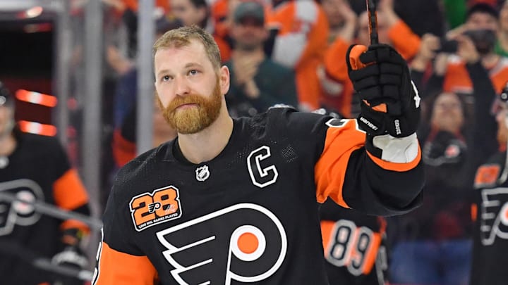 Mar 17, 2022; Philadelphia, Pennsylvania, USA; Philadelphia Flyers center Claude Giroux (28) acknowledges the crowd after playing in his 1000th game as a Flyer against the Nashville Predators at Wells Fargo Center.