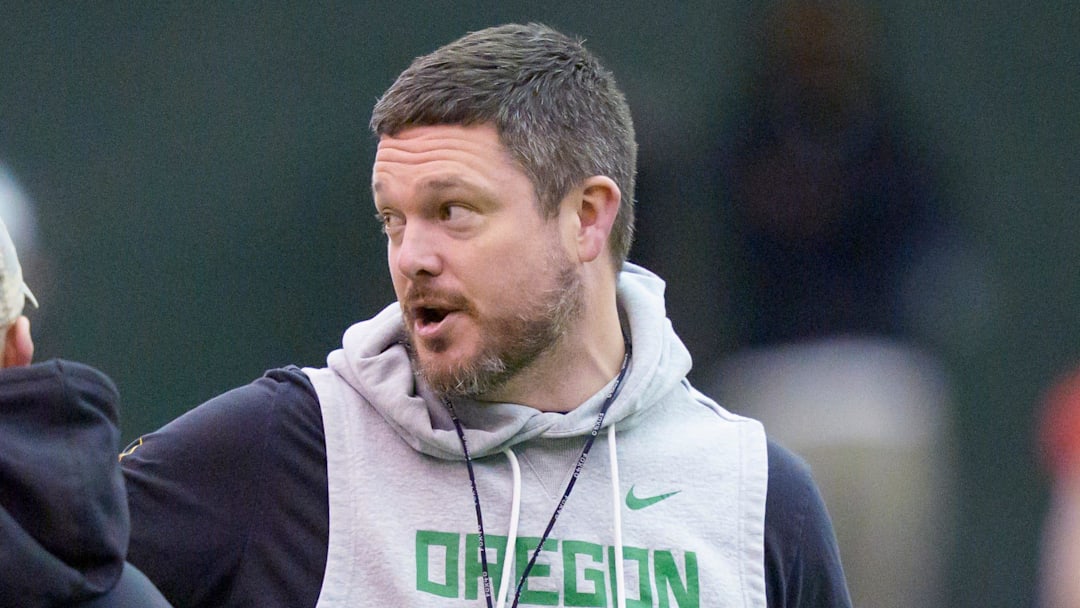 Oregon head coach Dan Lanning walks the field as the Oregon Ducks practice on Jan. 5, 2025, at the Moshofsky Center in Eugene, Oregon, ahead of the Peach Bowl.