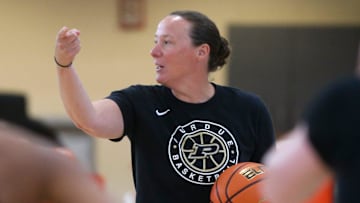 Purdue Boilermakers head coach Katie Gearlds gives drill instructions 