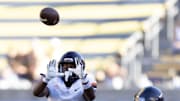 Nov 1, 2025; Berkeley, California, USA; Virginia Cavaliers wide receiver Cam Ross (6) catches a pass behind California Golden Bears defensive back Brent Austin (4) during the fourth quarter at California Memorial Stadium. Mandatory Credit: D. Ross Cameron-Imagn Images