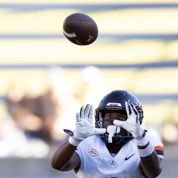 Nov 1, 2025; Berkeley, California, USA; Virginia Cavaliers wide receiver Cam Ross (6) catches a pass behind California Golden Bears defensive back Brent Austin (4) during the fourth quarter at California Memorial Stadium. Mandatory Credit: D. Ross Cameron-Imagn Images