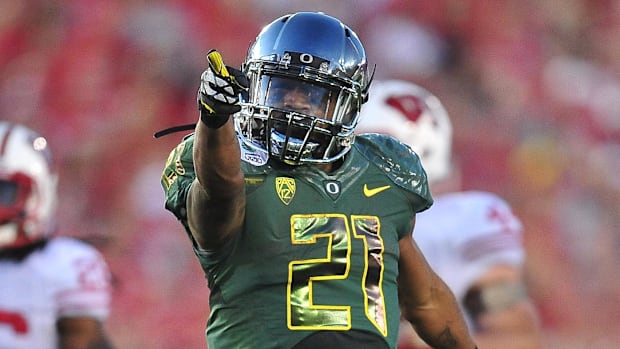  Oregon Ducks running back LaMichael James (21) reacts after getting a first down against the Wisconsin Badgers 