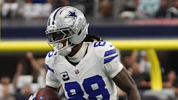 Sep 14, 2025; Arlington, Texas, USA; Dallas Cowboys wide receiver CeeDee Lamb (88) runs with the ball against the New York Giants at AT&T Stadium. Mandatory Credit: Raymond Carlin III-Imagn Images