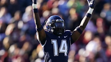 Oct 29, 2022; East Hartford, Connecticut, USA; Connecticut Huskies defensive back Malcolm Bell (14) reacts after a play against the Boston College Eagles in the second half at Rentschler Field at Pratt & Whitney Stadium. Mandatory Credit: David Butler II-Imagn Images