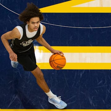 South Bend Washington's Steven Reynolds brings the ball up the court during a scrimmage at the Notre Dame Team Camp at Rolfs Athletics Hall on Thursday, June 13, 2024, in South Bend.