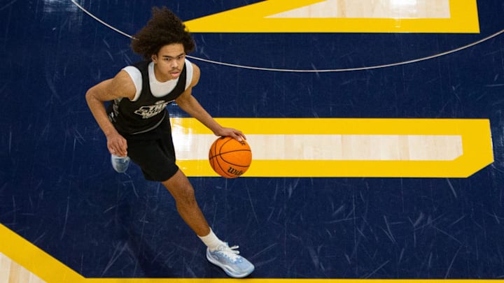 South Bend Washington's Steven Reynolds brings the ball up the court during a scrimmage at the Notre Dame Team Camp at Rolfs Athletics Hall on Thursday, June 13, 2024, in South Bend.