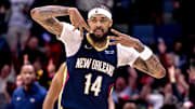 Dec 5, 2024; New Orleans, Louisiana, USA;  New Orleans Pelicans forward Brandon Ingram (14) reacts to making a three point basket against the Phoenix Suns during the first half  at Smoothie King Center. Mandatory Credit: Stephen Lew-Imagn Images