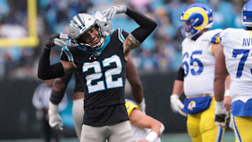 Nov 30, 2025; Charlotte, North Carolina, USA; Carolina Panthers safety Lathan Ransom (22) celebrates after a play during the third quarter against the Los Angeles Rams at Bank of America Stadium.