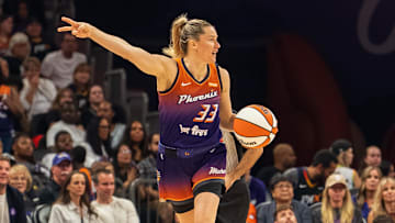 Aug 30, 2025; Phoenix, Arizona, USA; Phoenix Mercury guard Sami Whitcomb (33) calls out a play as she brings the ball down the court in the first half against the New York Liberty at Footprint Center. Mandatory Credit: Allan Henry-Imagn Images