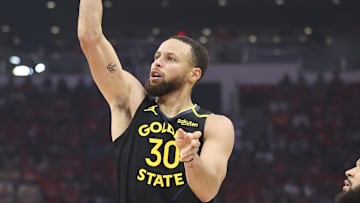 May 4, 2025; Houston, Texas, USA; Golden State Warriors guard Stephen Curry (30) shoots the ball during the first quarter of game seven of the first round for the 2025 NBA Playoffs against the Houston Rockets at Toyota Center. Mandatory Credit: Troy Taormina-Imagn Images