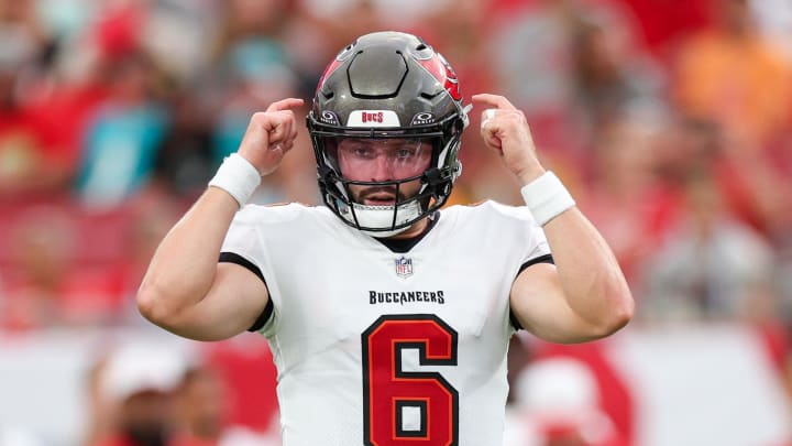 Aug 23, 2024; Tampa, Florida, USA; Tampa Bay Buccaneers quarterback Baker Mayfield (6) calls a play at the line against the Miami Dolphins in the first quarter during preseason at Raymond James Stadium. Mandatory Credit: Nathan Ray Seebeck-USA TODAY Sports