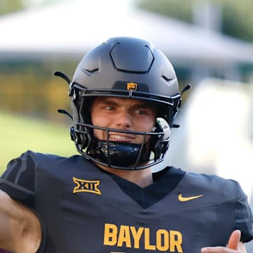 Sep 20, 2025; Waco, Texas, USA; Baylor Bears quarterback Sawyer Robertson (13) during warm ups before the game against the Arizona State Sun Devils at McLane Stadium. Mandatory Credit: Chris Jones-Imagn Images