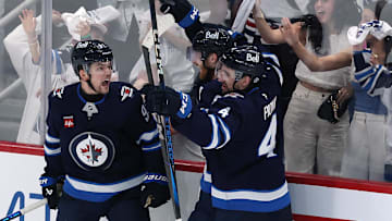 Winnipeg Jets center Cole Perfetti celebrates his goal against the St. Louis Blues with team mates in the third period in game seven of the first round of the 2025 Stanley Cup Playoffs at Canada Life Centre. 