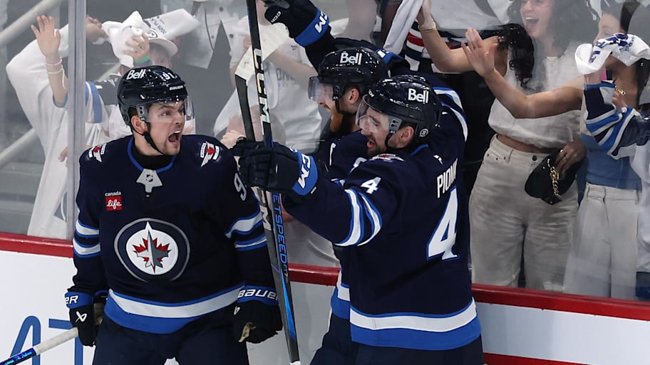 Winnipeg Jets center Cole Perfetti celebrates his goal against the St. Louis Blues with team mates in the third period in game seven of the first round of the 2025 Stanley Cup Playoffs at Canada Life Centre.  | James Carey Lauder-Imagn Images