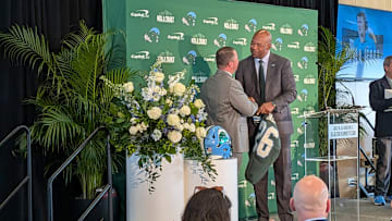 New Football Head Coach Will Hall Shakes AD David Harris' Hands