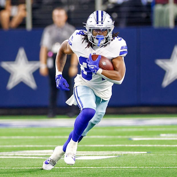 Dallas Cowboys running back Jaydon Blue carries the ball during the fourth quarter against the Atlanta Falcons.