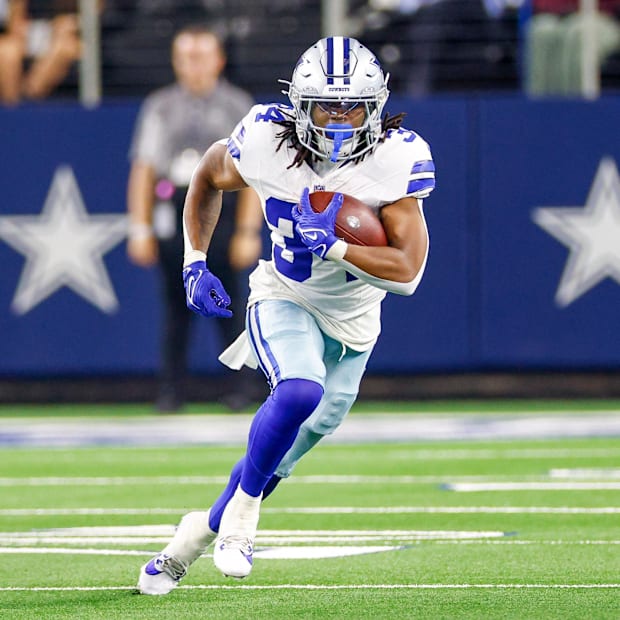 Dallas Cowboys running back Jaydon Blue carries the ball during the fourth quarter against the Atlanta Falcons.