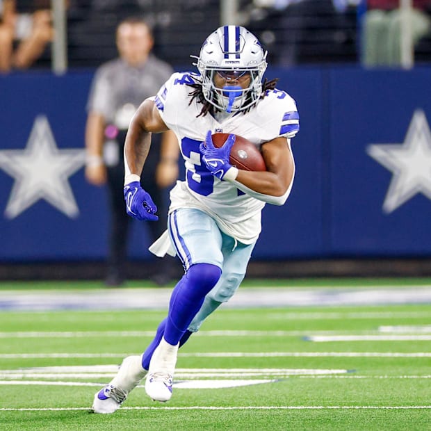 Dallas Cowboys running back Jaydon Blue carries the ball during the fourth quarter against the Atlanta Falcons