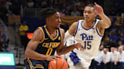 Cal's Jeremiah Wilkinson drives on Pitt's Jaland Lowe 