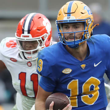 Nov 16, 2024; Pittsburgh, Pennsylvania, USA;  Pittsburgh Panthers quarterback Nate Yarnell (19) runs the ball against the Clemson Tigers during the fourth quarter at Acrisure Stadium. Mandatory Credit: Charles LeClaire-Imagn Images