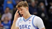 Mar 29, 2025; Newark, NJ, USA; Duke Blue Devils forward Cooper Flagg (2) reacts after being hit in the head during the first half against the Alabama Crimson Tide in the East Regional final of the 2025 NCAA tournament at Prudential Center. Mandatory Credit: Robert Deutsch-Imagn Images