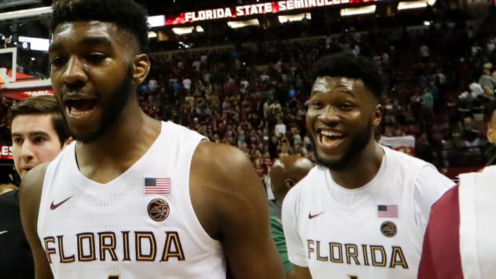 Florida State Seminoles forward Patrick Williams (4), Florida State Seminoles forward Raiquan Gray (1) and Florida State Seminoles guard Devin Vassell (24) celebrate a big victory over Virginia at the Donald L. Tucker Civic Center Wednesday, Jan. 15, 2020.

Fsu Vs Virginia 011520 Ts 046