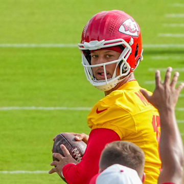 Jul 22, 2025; St. Joseph, MO, USA; Kansas City Chiefs quarterback Patrick Mahomes (15) receives a snap during training camp at Missouri Western State University. Mandatory Credit: Denny Medley-Imagn Images