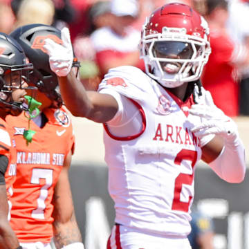 Arkansas Razorbacks wide receiver Andrew Armstrong motions first down against the Oklahoma State Cowboys.