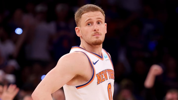 May 19, 2024; New York, New York, USA; New York Knicks guard Donte DiVincenzo (0) reacts after a three point shot against the Indiana Pacers during the third quarter of game seven of the second round of the 2024 NBA playoffs at Madison Square Garden. Mandatory Credit: Brad Penner-USA TODAY Sports
