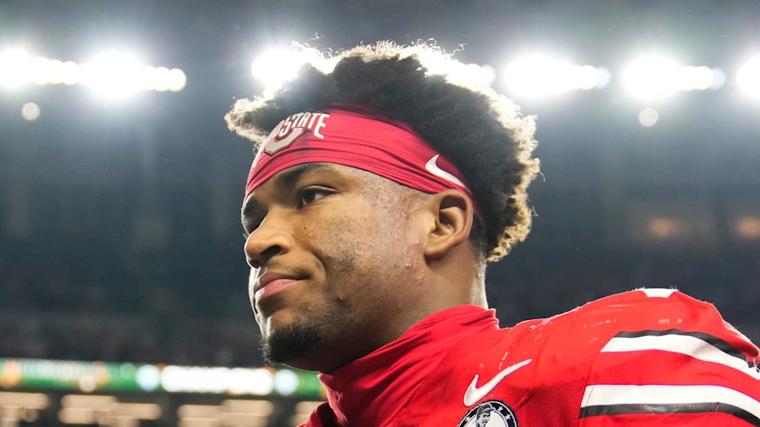 Ohio State Buckeyes defensive back Caleb Downs leaves the field following the Cotton Bowl at AT&T Stadium