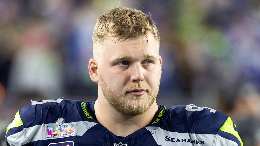 Seattle Seahawks defensive tackle Rylie Mills walks off the field after Super Bowl LX