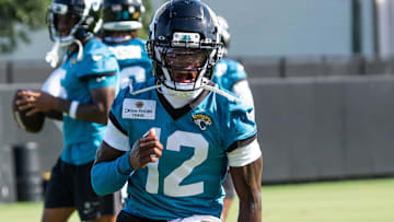 Jacksonville Jaguars wide receiver Travis Hunter (12) runs a passing drill during the Jacksonville Jaguars’ third mandatory minicamp Thursday June 12, 2025 at the Miller Electric Center in Jacksonville, Fla. [Doug Engle/Florida Times-Union]