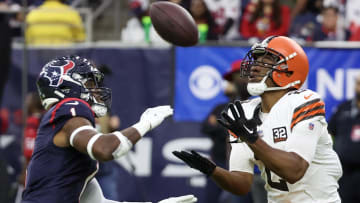 Dec 24, 2023; Houston, Texas, USA; Cleveland Browns wide receiver Amari Cooper (2) catches the ball against Houston Texans safety Jimmie Ward (1) in the first quarter at NRG Stadium. Mandatory Credit: Thomas Shea-USA TODAY Sports